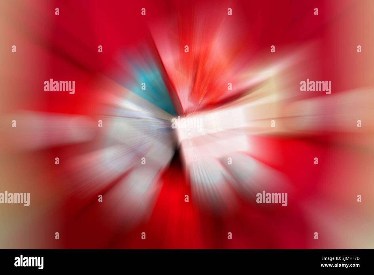 Rosso dinamico e linee bianche di luce. La luce dal punto centrale. Foto Stock