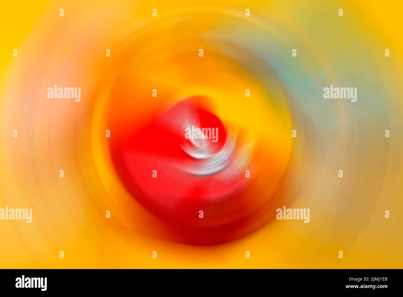 Abstract di sfondo colorato Spin radiale del cerchio Motion Blur. Foto Stock