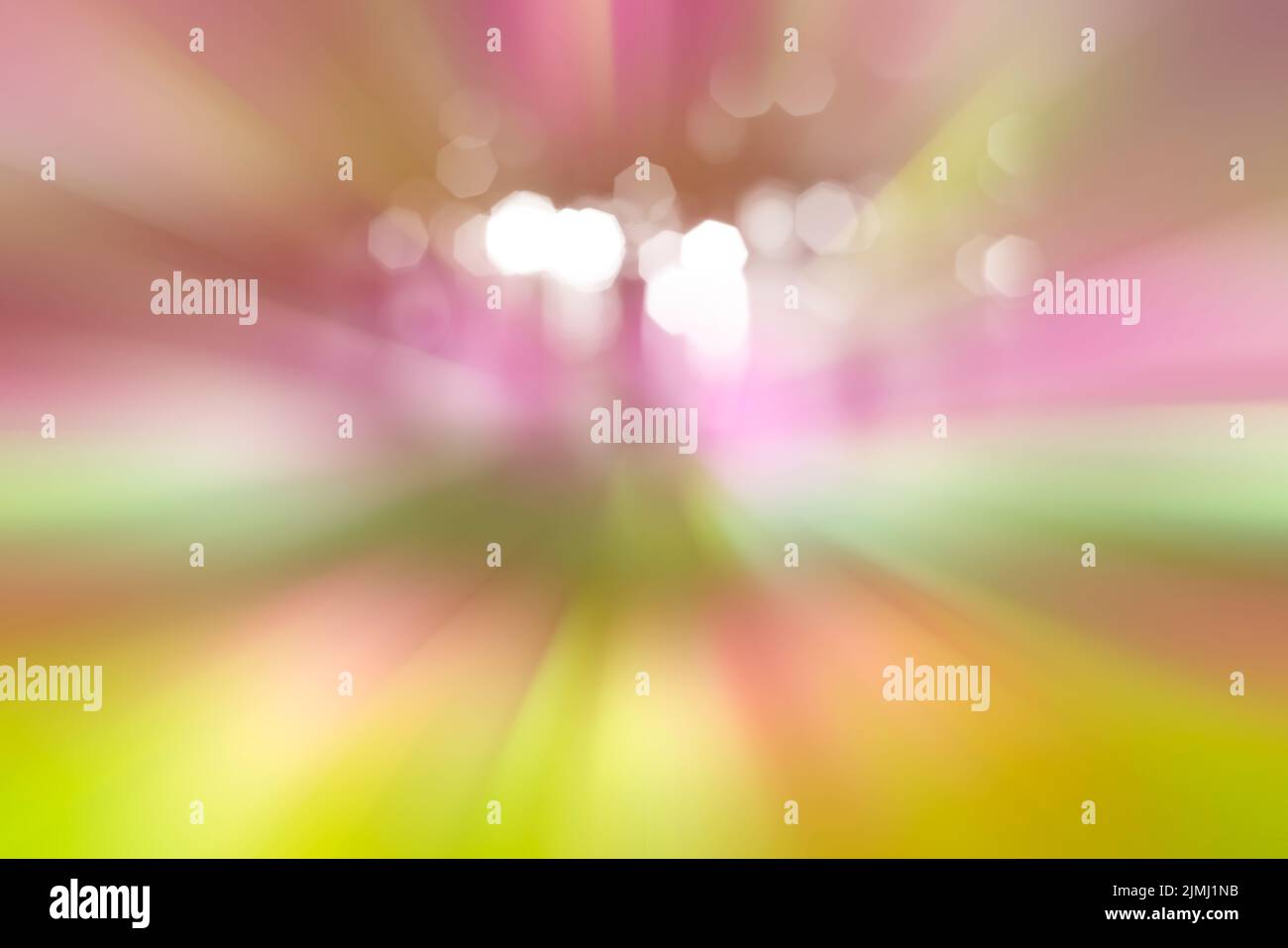 Luci di vacanza. Rosa dinamico di linee di luce. La luce dal punto centrale. Foto Stock