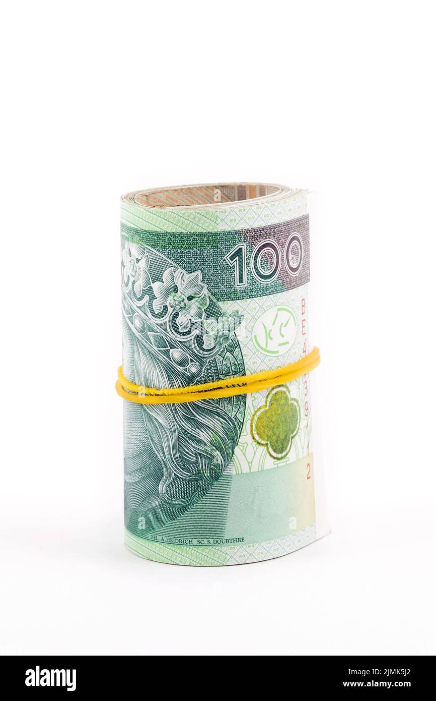 Arrotolati soldi polacchi - Zloty Foto Stock