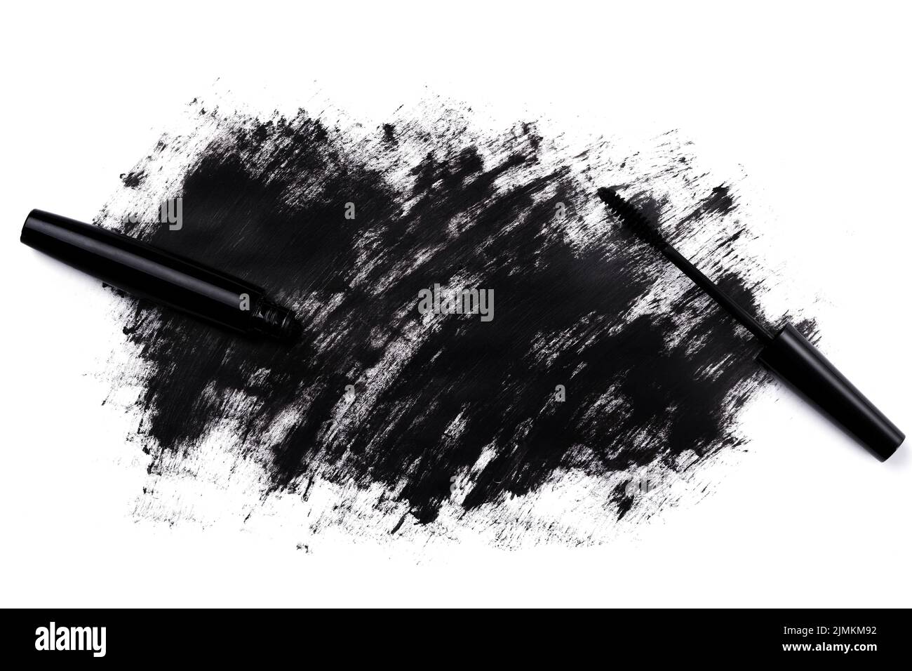 Bacchetta nera e mascara macchiata su sfondo bianco Foto Stock