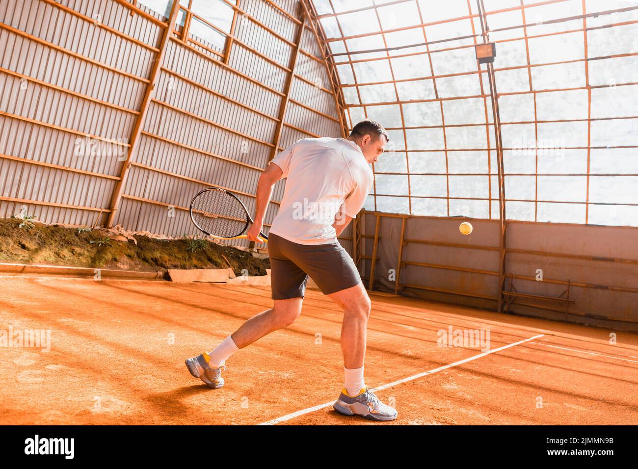 Movimento del giocatore di tennis Foto Stock