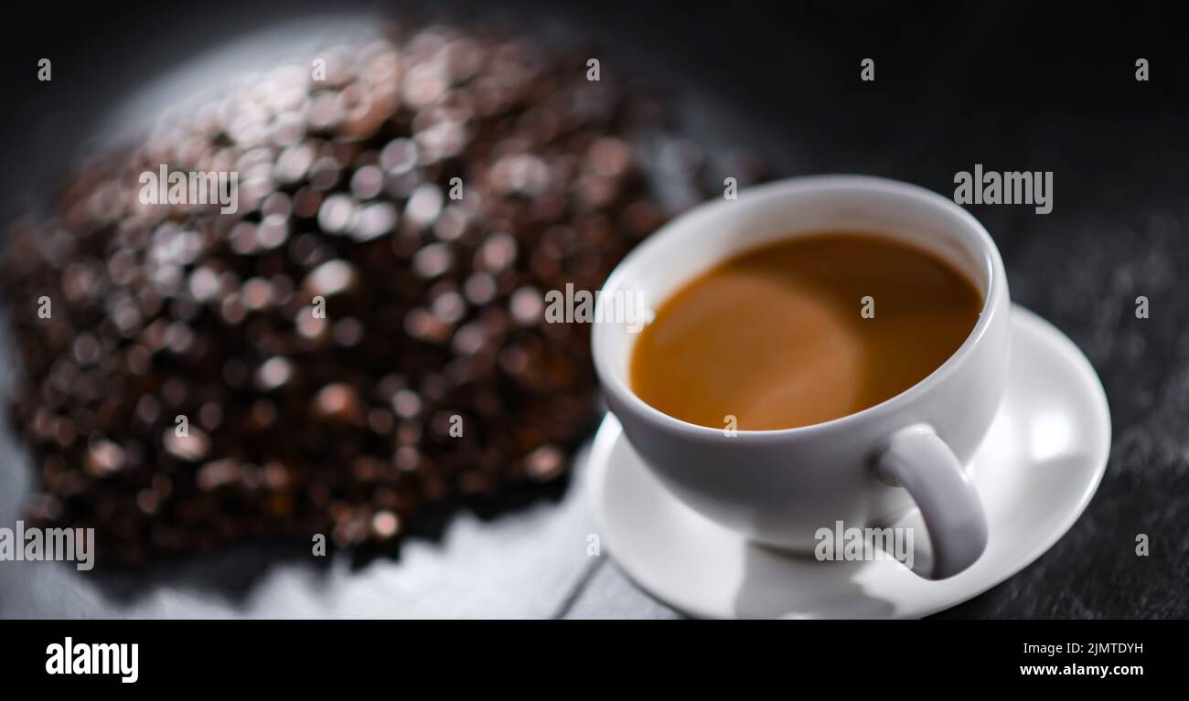 Composizione con una tazza di caffè Foto Stock