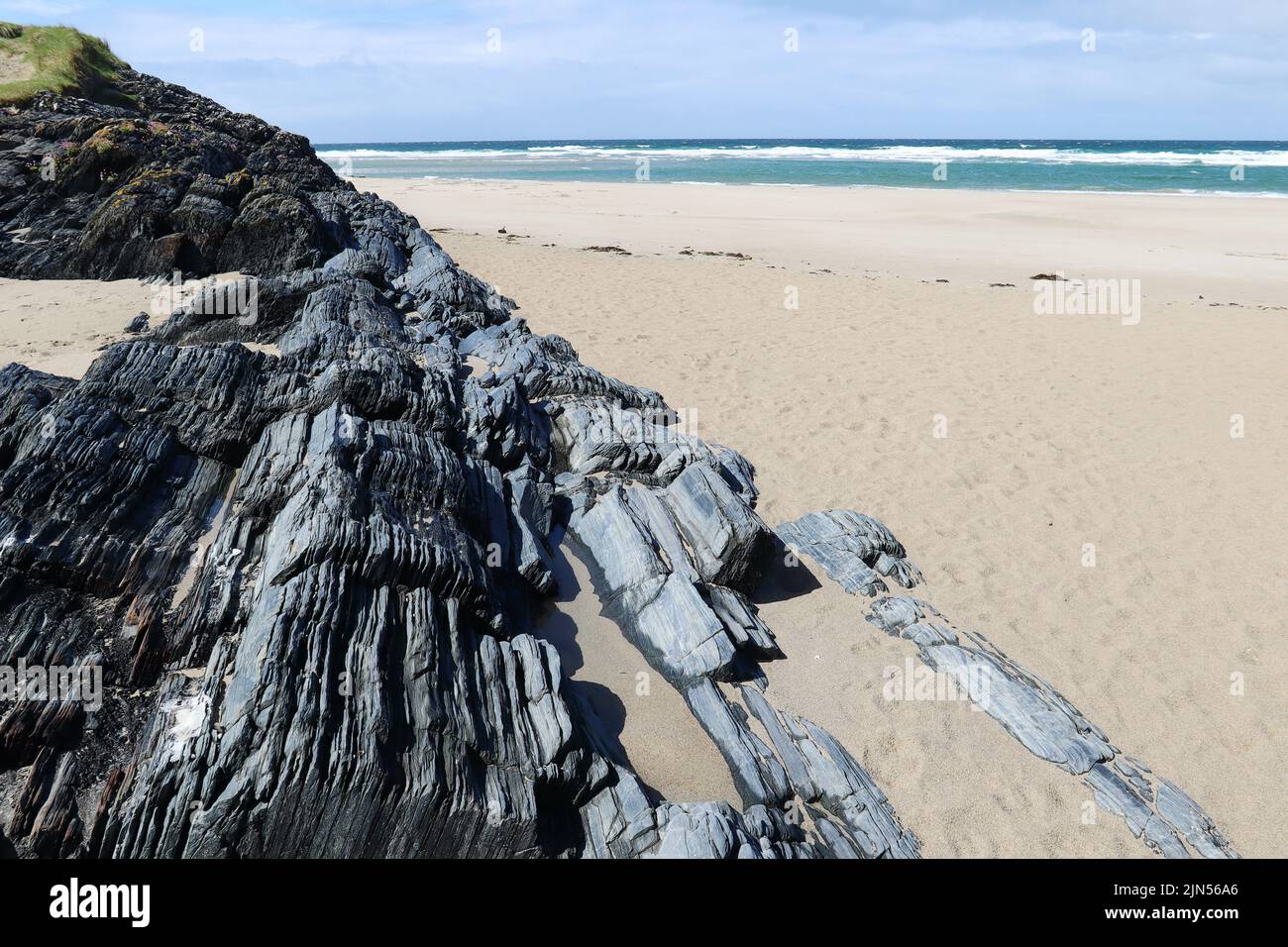 Formazioni rocciose sulla costa occidentale di Islay, Scozia Foto Stock