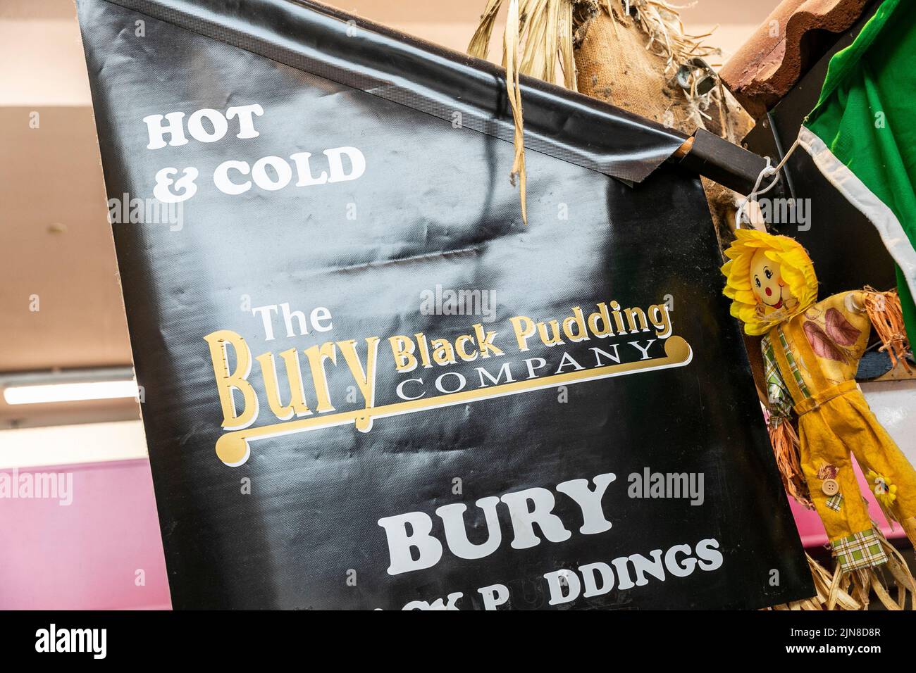 Bury black pudding banner aziendale a Bury indoor markets, Manchester, Lancashire, Inghilterra, UK, 2022 Foto Stock