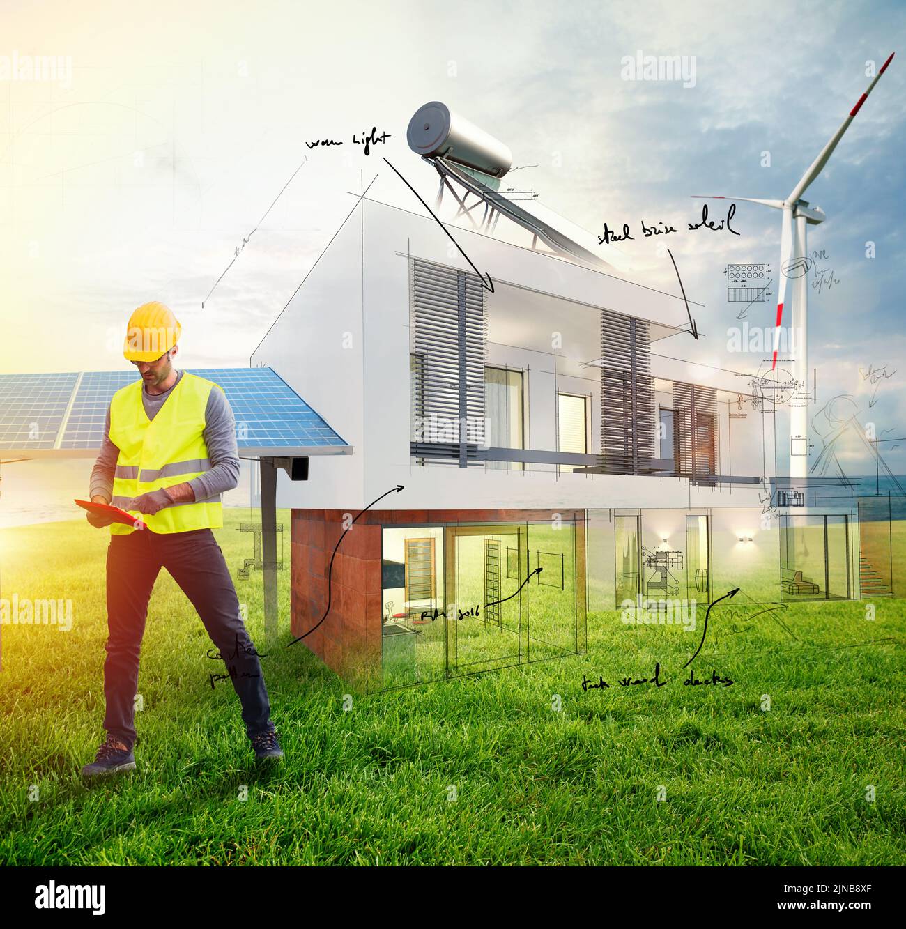 Tecnico al lavoro con un edificio di una nuova casa Foto Stock