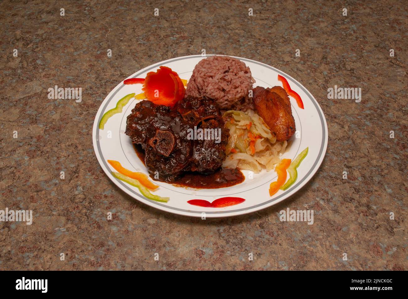 Deliziosa e autentica cucina caraibica conosciuta come "coda di bue" Foto Stock