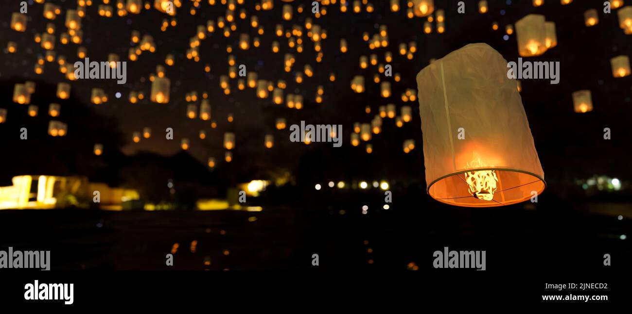 Un gruppo di bella lanterna del cielo sullo sfondo. Loy Krathong Festival, Yi Peng Festival in Thailandia, sfondo lanterna volante cinese. 3d renderi Foto Stock