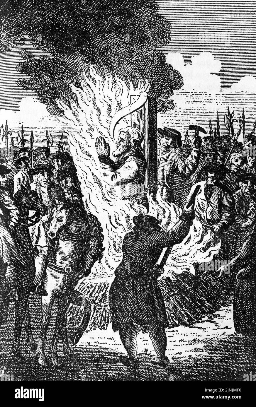 Incisione del martirio di Laurence Saunders a Coventry il 8 febbraio 1555. Prima di essere incatenato al palo, lo baciò, dicendo: 'Benvenuti la croce di Cristo, accogliete la vita eterna!' Foto Stock