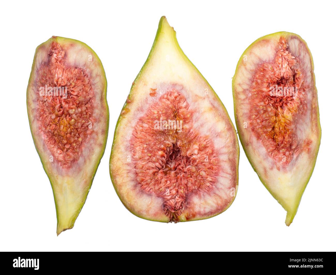 Pezzi di fichi verdi tritati. Frutta matura e succosa. Cibo di dieta. Fig. Isola. Semi all'interno di frutta tagliata Foto Stock