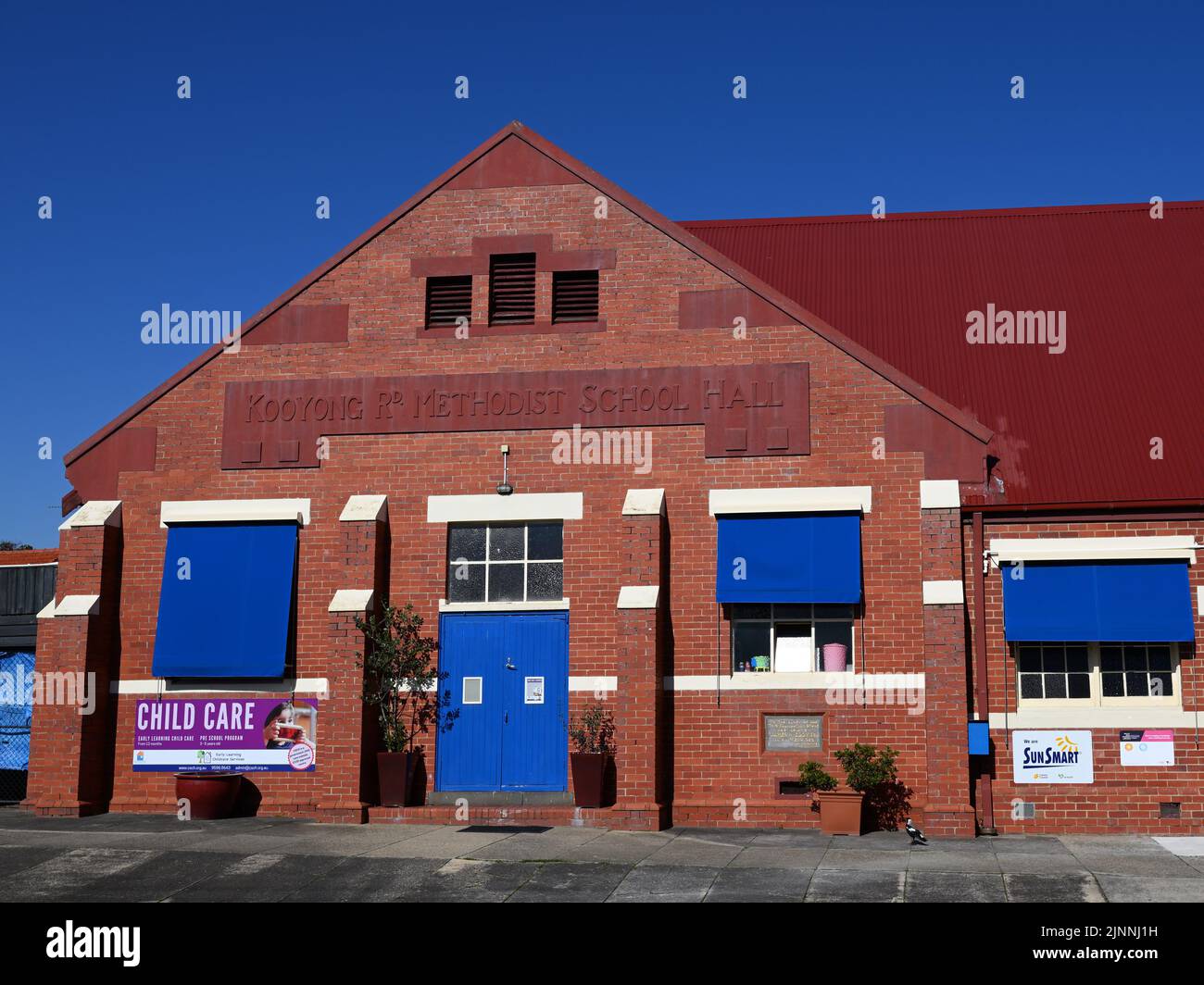 Esterno dell'ex Kooyong Rd Methodist School Hall, un edificio in mattoni rossi dei primi anni del 1900s, oggi centro comunitario e prescolastica Foto Stock