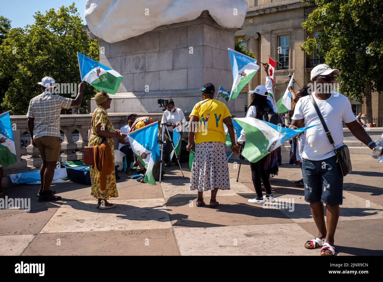 13 agosto 2022, Trafalgar Square Londra UK. Gli abitanti della nazione Yoruba, che vivono in alcune parti della Nigeria protestando con la musica contro le condizioni in Nigeria: Nessuna democrazia, nessuna giustizia, il governo di Buhari è morto, e che Buhari è un terrorista. Foto Stock