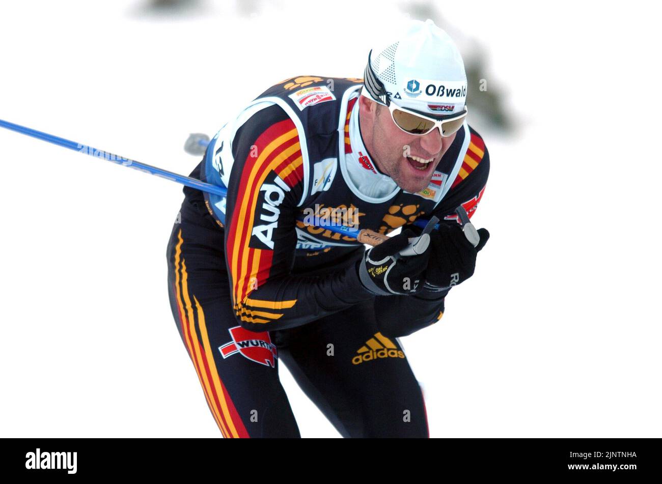 FOTO DI ARCHIVIO: Andreas SCHLUETTER avrà 50 anni il 17 agosto 2022, Andreas SCHLUETTER, GER, azione, 15 km dall'inseguimento C e F uomini, sci nordico, sci di fondo Coppa del mondo 21.01.2006. ?SVEN SIMON, Princess-Luise-Str. 41#45479 Muelheim/Ruhr#tel.0208/9413250#fax 0208/9413260#account 1428150 Commerzbank e ssen BLZ 36040039#www.SvenSimon.net#e-mail: Foto Stock