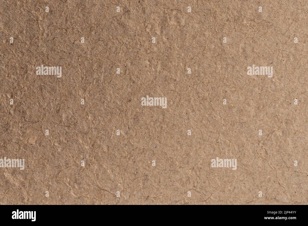Rexture grossolana della superficie di carta marrone macro vista primo piano Foto Stock