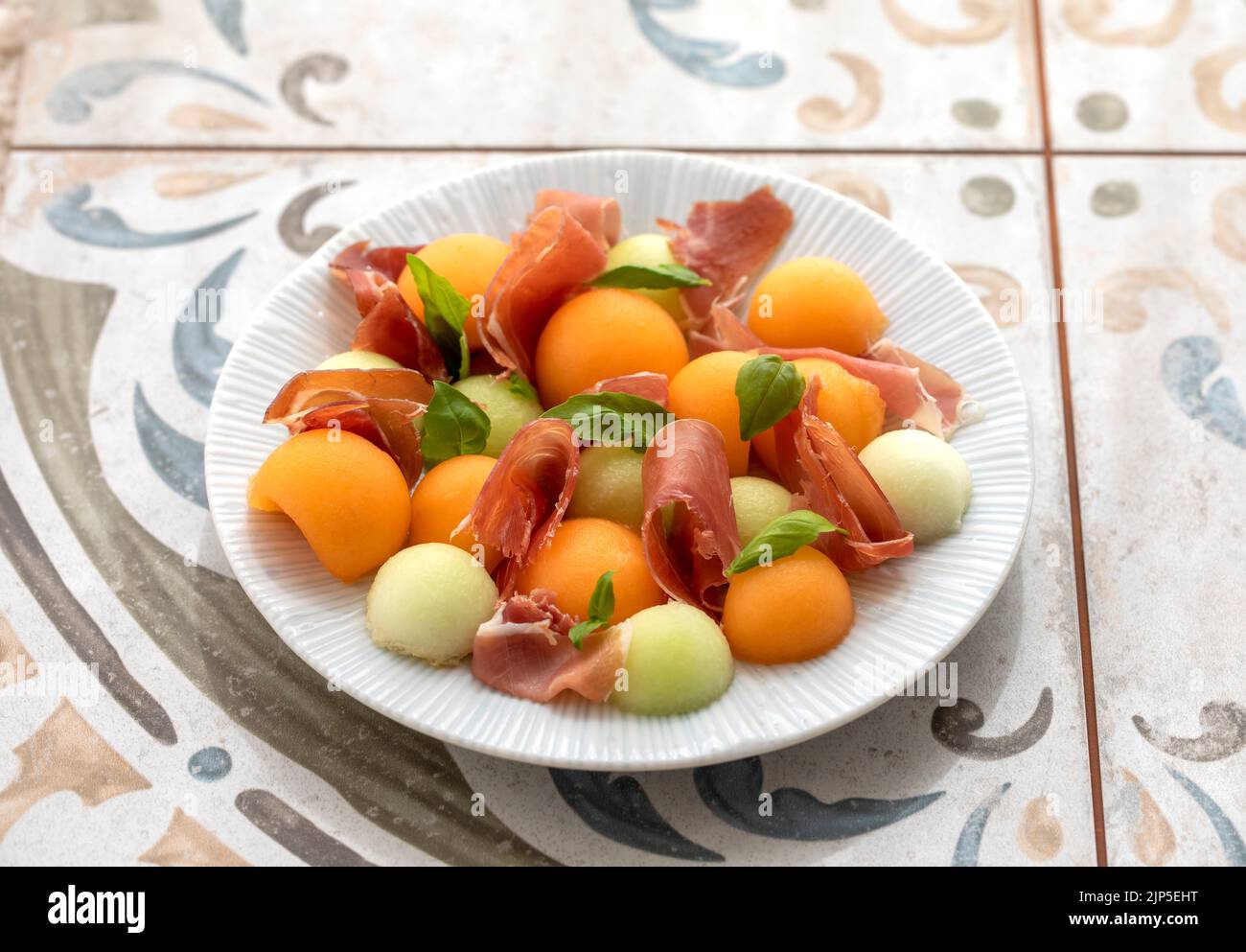 Tapas spagnole, melone con prosciutto di parma Foto Stock