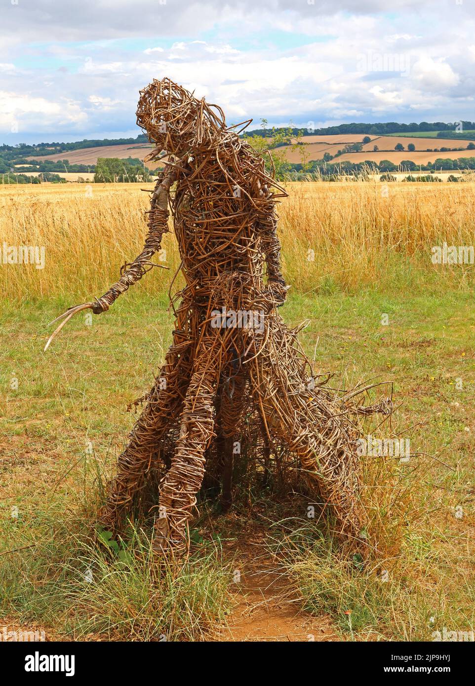 Rollright Stones - Wicker Water diviner , The Whispering Knights, Little Rollright, Long Compton, Warwickshire, INGHILTERRA, REGNO UNITO, OX7 5QB Foto Stock