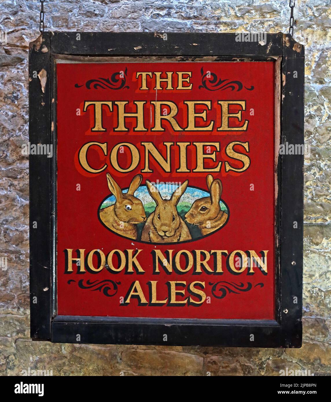 Le tre conie - Hook Norton Ales classico segno da pub, Oxfordshire artigianato birre, Hook Norton, Banbury, Oxen, INGHILTERRA, REGNO UNITO, OX15 5NY Foto Stock