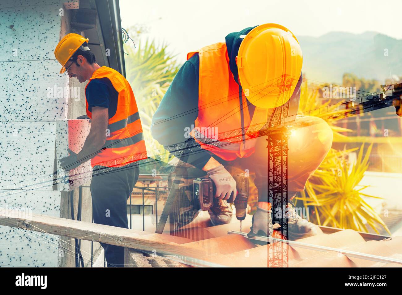 I tecnici lavorano per la costruzione di nuovi edifici Foto Stock