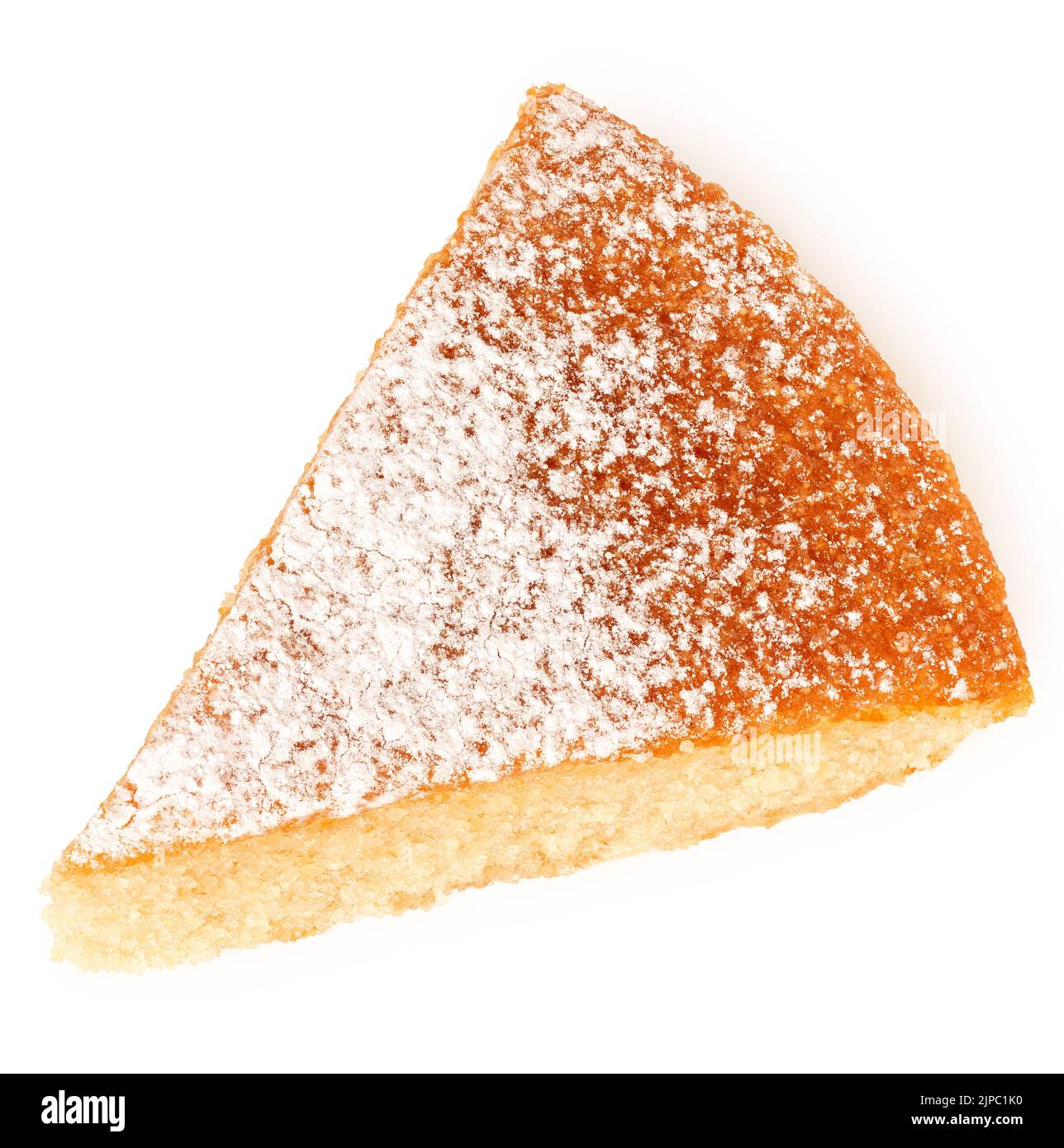 Spicchio di pan di Spagna al limone con glassa di zucchero a velo isolato su bianco. Vista dall'alto. Foto Stock