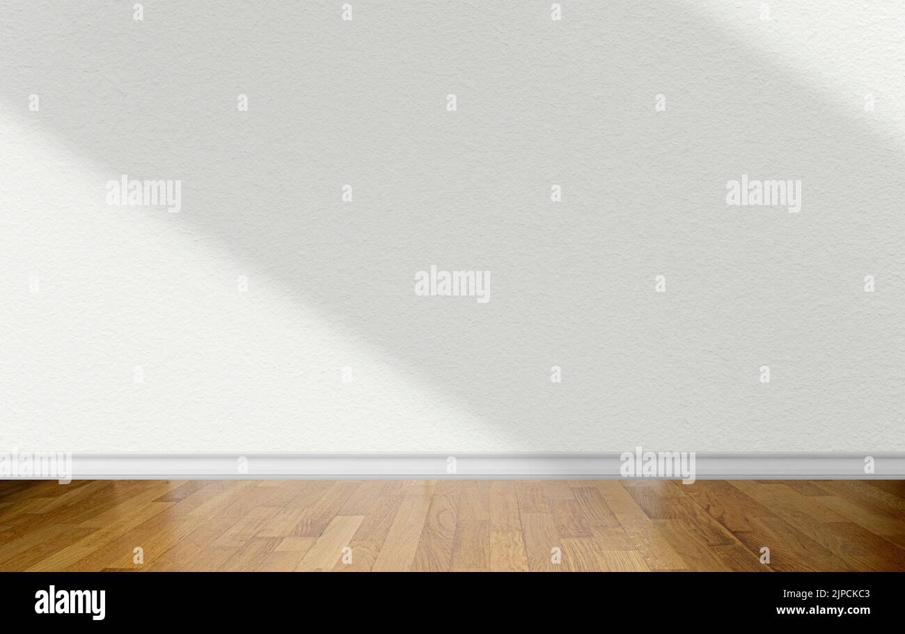 Stanza vuota con parete bianca con ombre astratte sulla superficie e pavimento in parquet di legno come mockup business Foto Stock