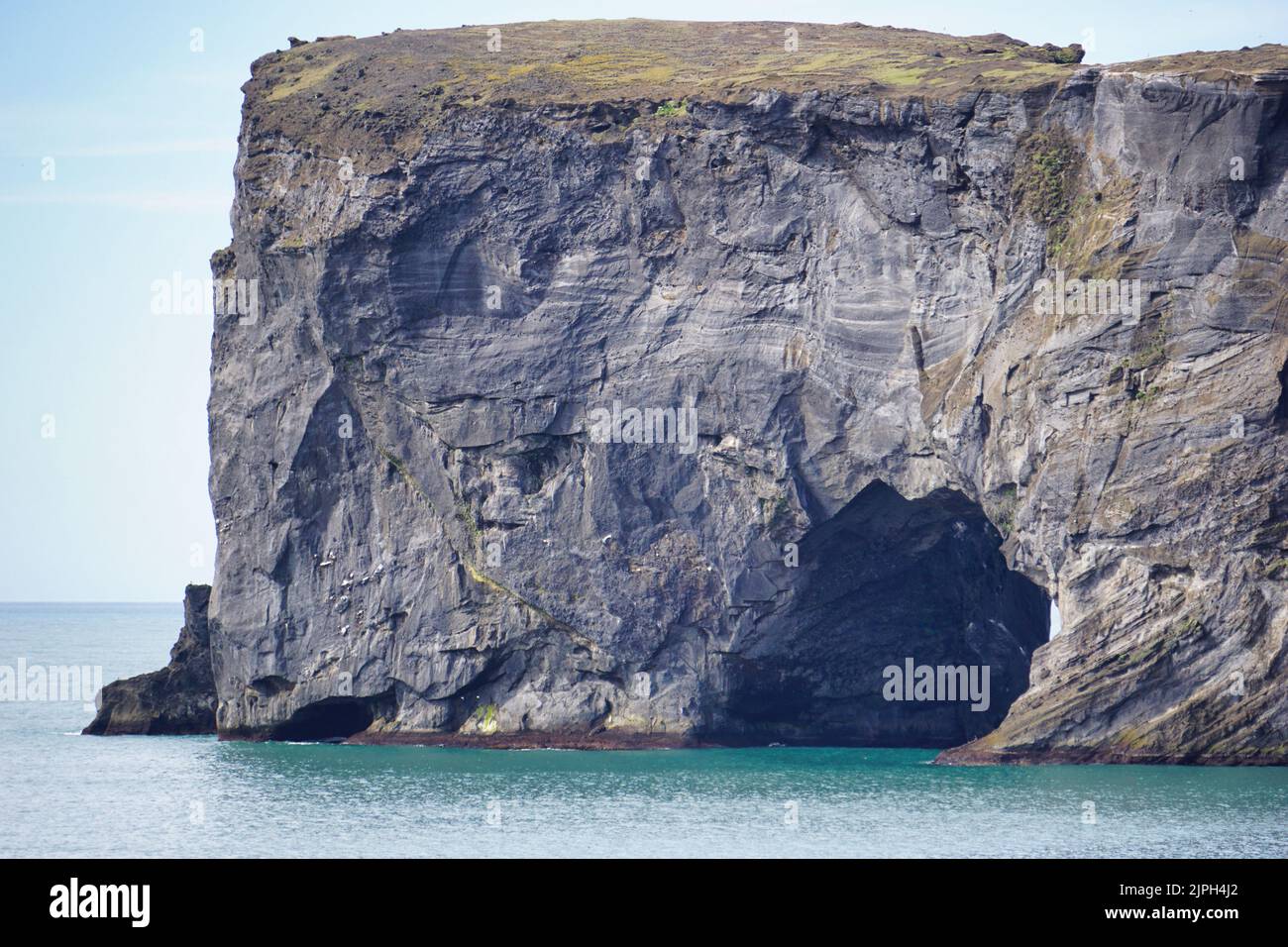 Scogliera a Reynisfjara Black Beach in Islanda Foto Stock