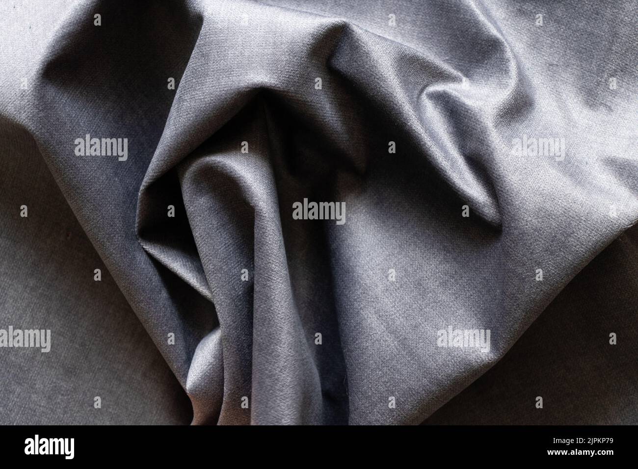 Tessuto grinzito grigio per lo sfondo, tessuto per la foto macro di sfondo Foto Stock
