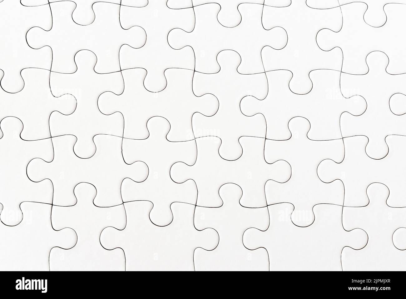 vista ravvicinata dello sfondo bianco del puzzle Foto Stock