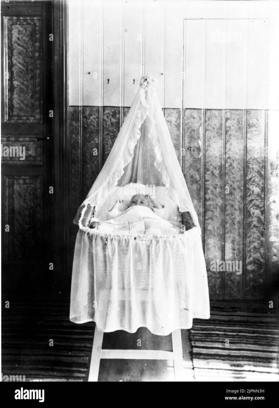 Hans Thilander nel suo letto. Hans Thilander i sin säng. Foto Stock