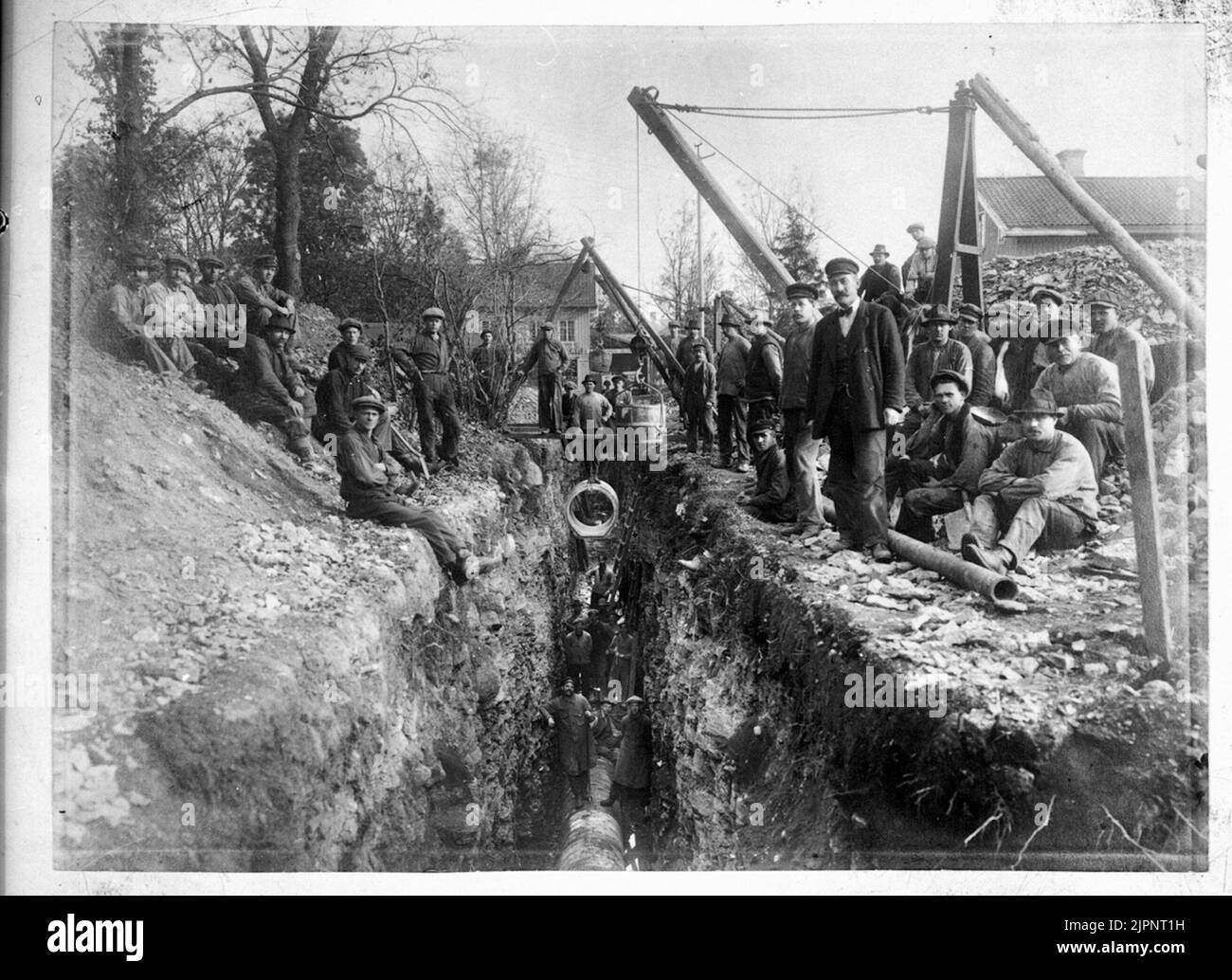 Chiusura della gestione delle acque reflue. Nedläggning AV kloakledning. Foto Stock