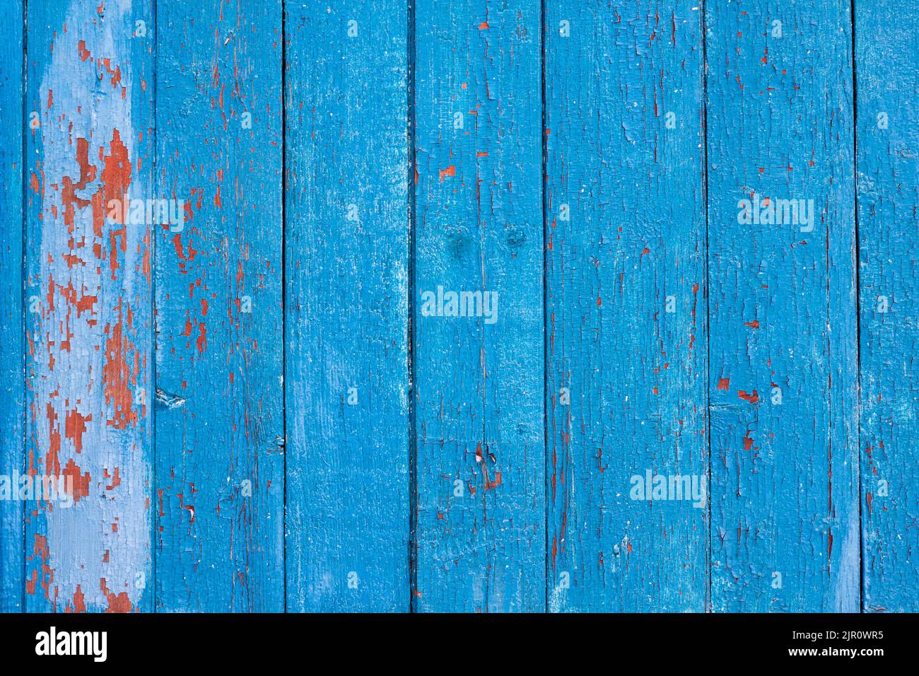 Vecchio sfondo di legno con vernice incrinata Foto Stock