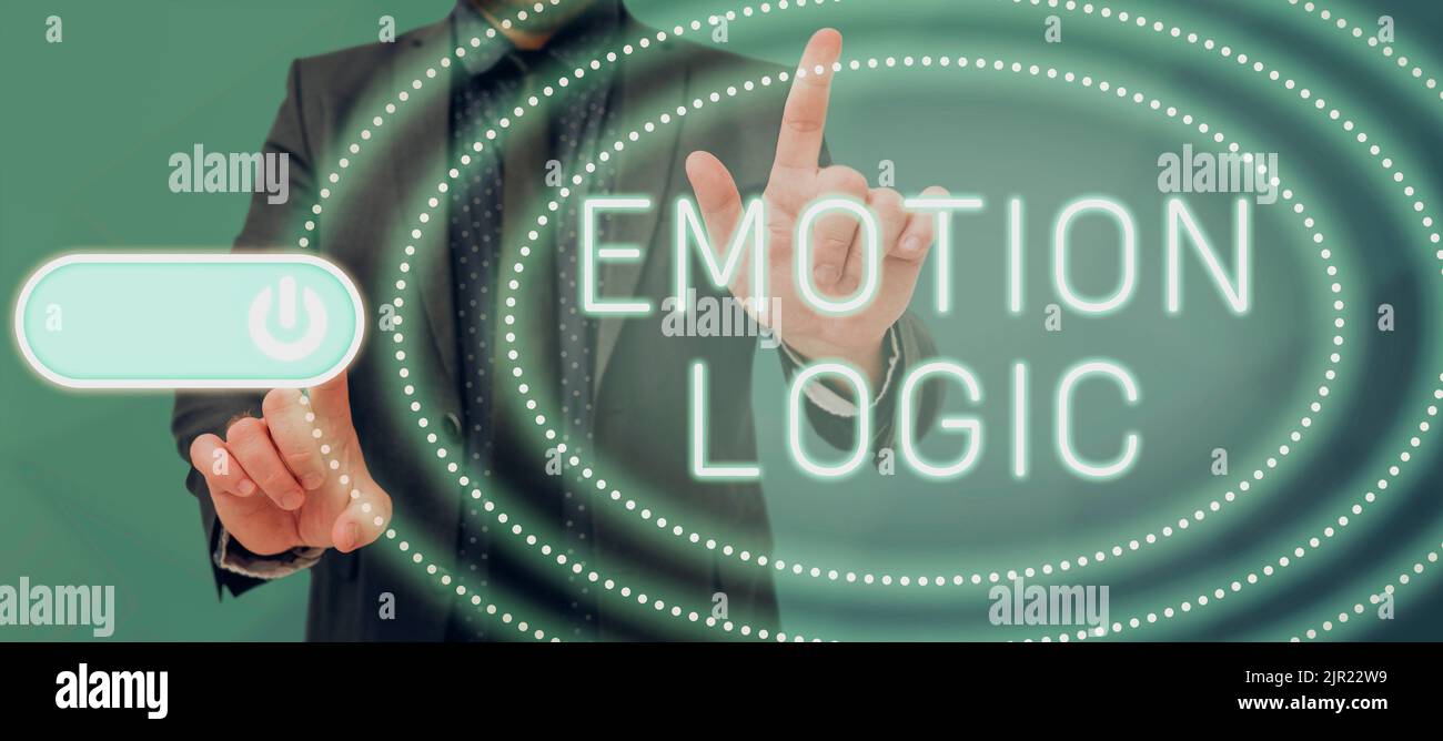 Scrittura a mano di testo Emotion Logic. Business approccio cuore o anima cerebrale o intelligenza confusione equilibrio uguale uomo d'affari che punta con due dita Foto Stock