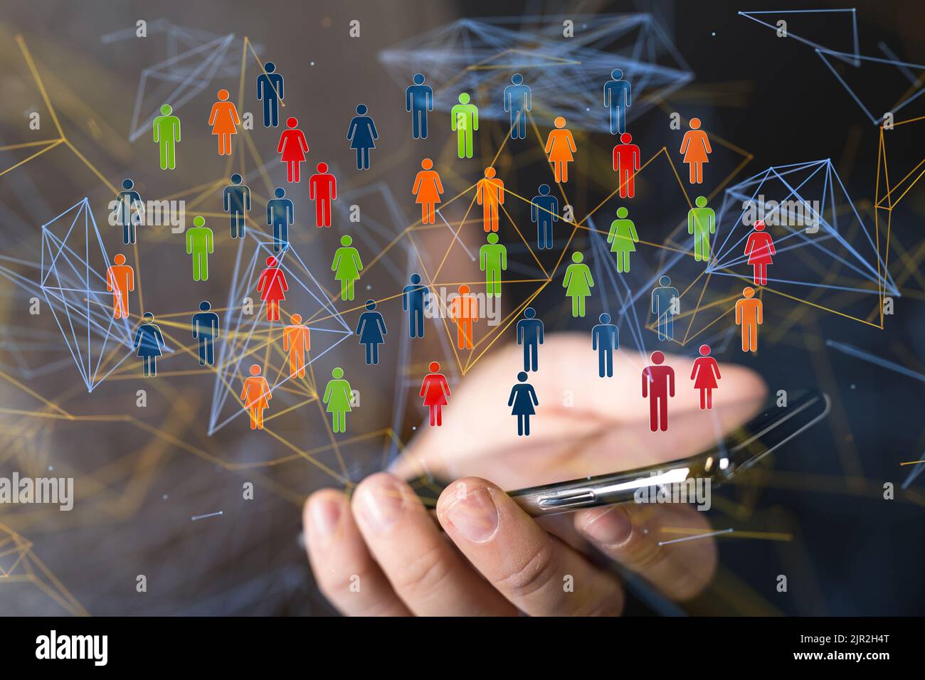 Le colorate icone digitali delle persone che sorvolano la mano tenendo in mano uno smartphone. Foto Stock