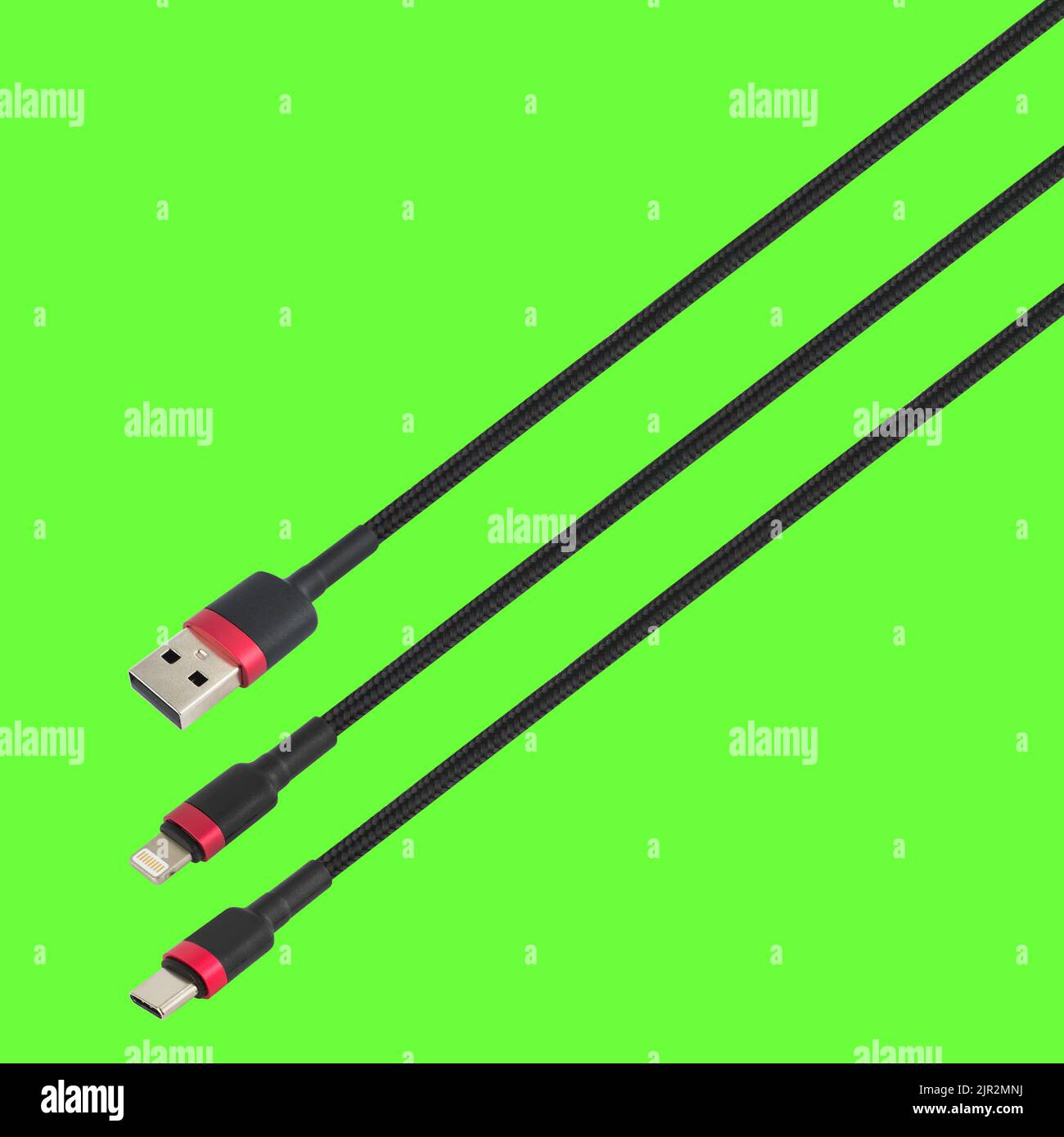 Cavo con connettore USB, tipo C e Lightning, isolato su sfondo verde Foto Stock