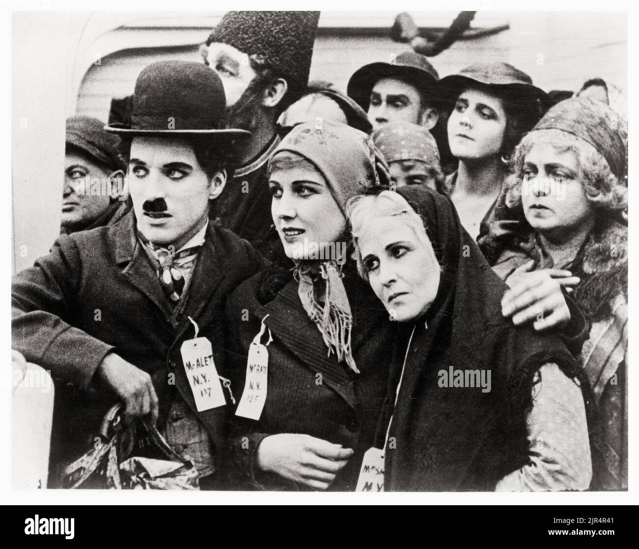 Charlie Chaplin in una scena da 'l'immigrato' Foto Stock