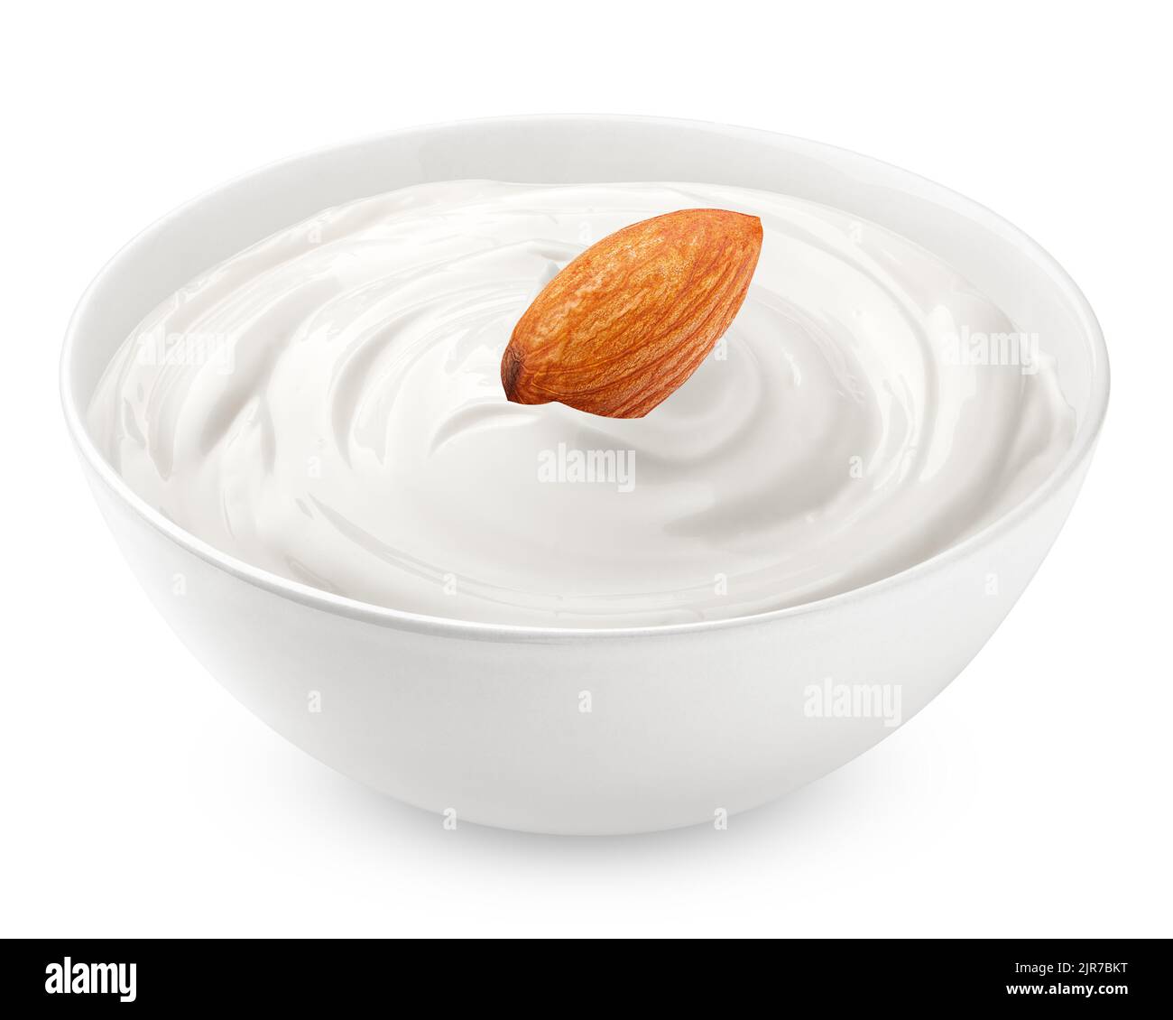 mandorla con panna acida, yogurt, isolato su fondo bianco, percorso di ritaglio, profondità di campo piena Foto Stock