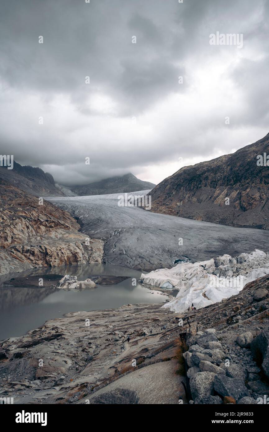 Il ghiacciaio Rhône è un ghiacciaio delle Alpi svizzere, la sorgente del fiume Rhône e uno dei principali contributori del lago di Ginevra. Foto Stock