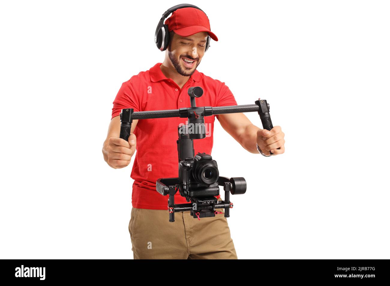 L'operatore della telecamera registra con una telecamera e uno stabilizzatore isolati su sfondo bianco Foto Stock