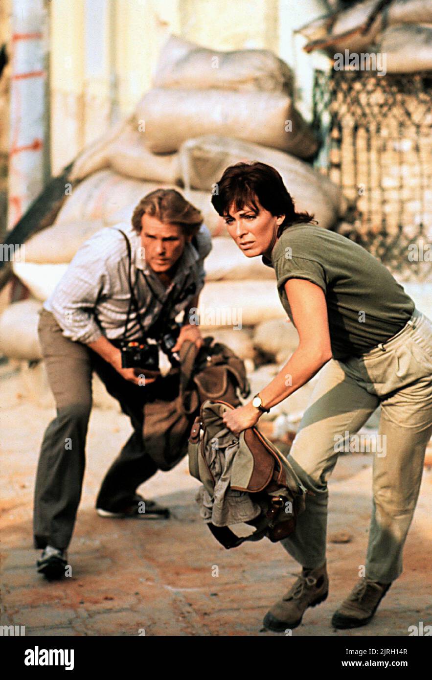 NICKE NOLTE, JOANNA CASSIDY, sotto il fuoco, 1983 Foto Stock