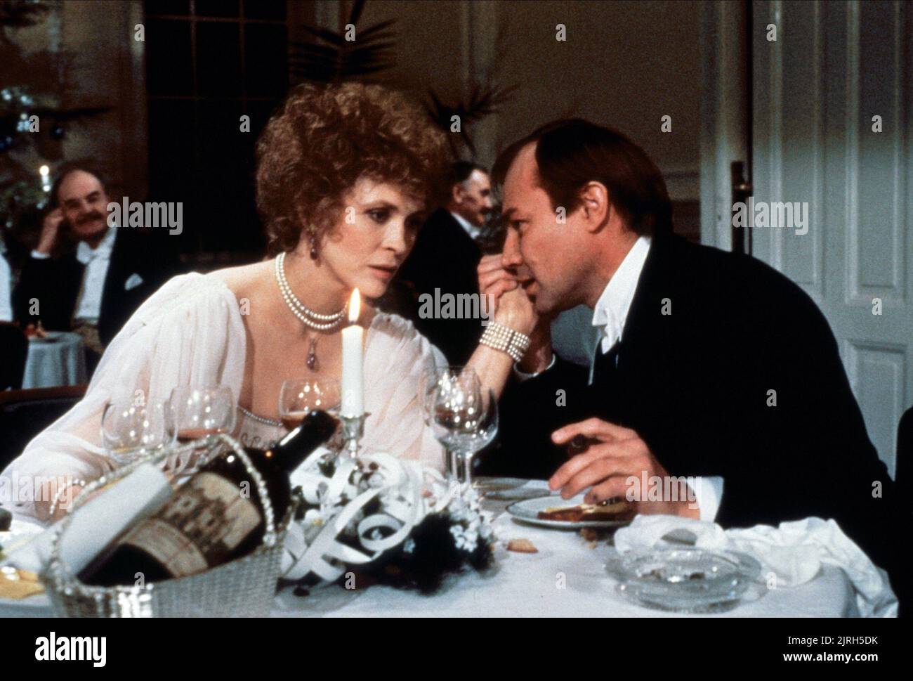 FAYE DUNAWAY, Klaus Maria BRANDAUER, bruciando segreto, 1988 Foto Stock
