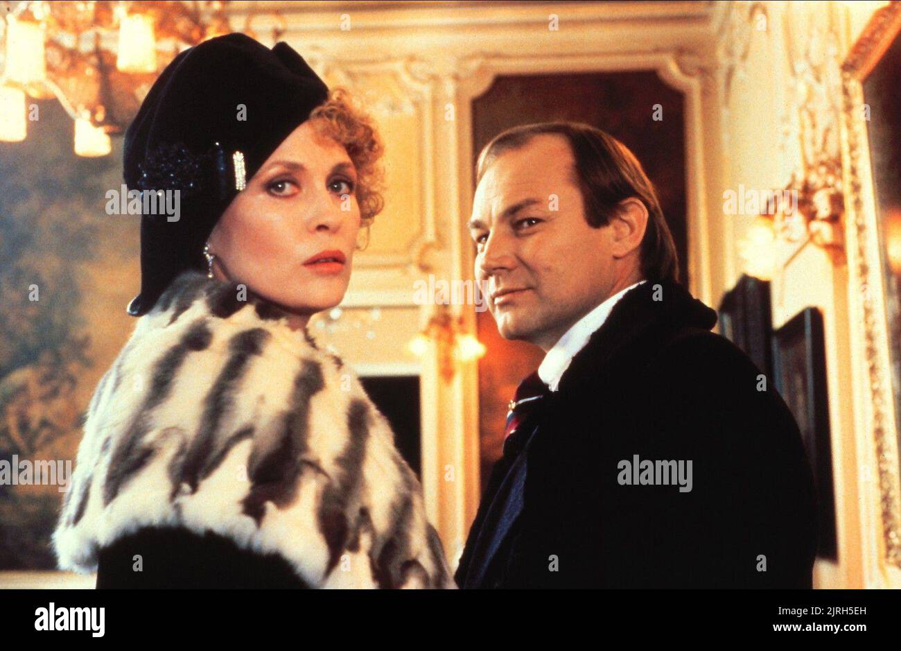 FAYE DUNAWAY, Klaus Maria BRANDAUER, bruciando segreto, 1988 Foto Stock