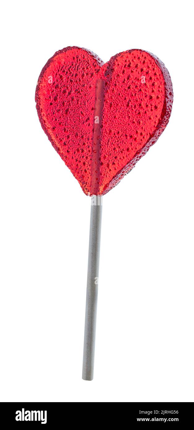 Classico cuore forma lollipop rosso su bastone di legno isolato Foto Stock