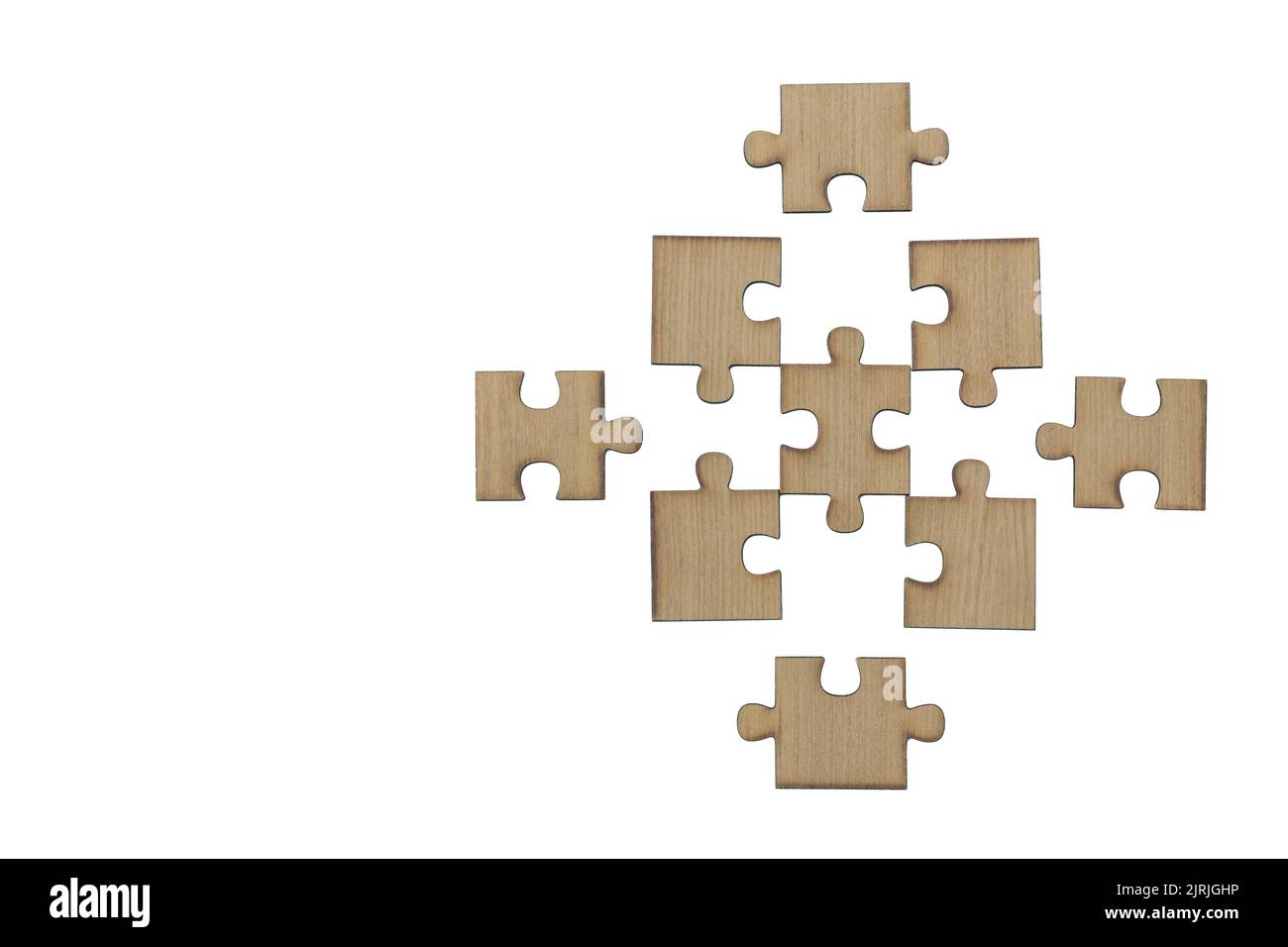 Puzzle in legno, pezzi di un puzzle, ultimo puzzle, isolato su sfondo bianco Foto Stock