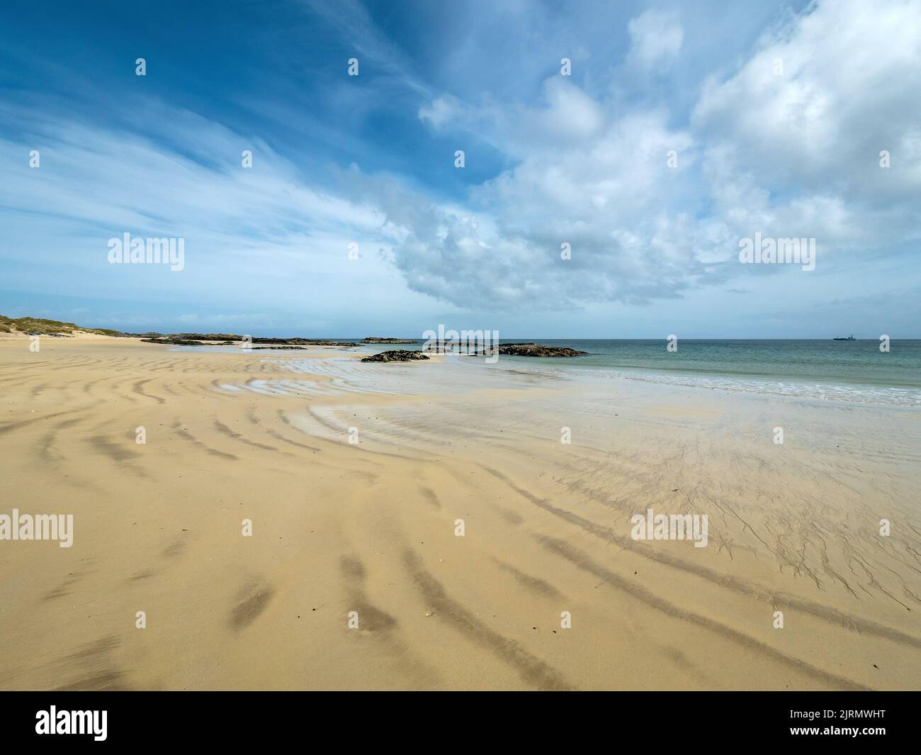 La remota e bella sabbia di Balnahard Beach sull'isola di Ebridean di Colonsay, Scozia, Regno Unito Foto Stock