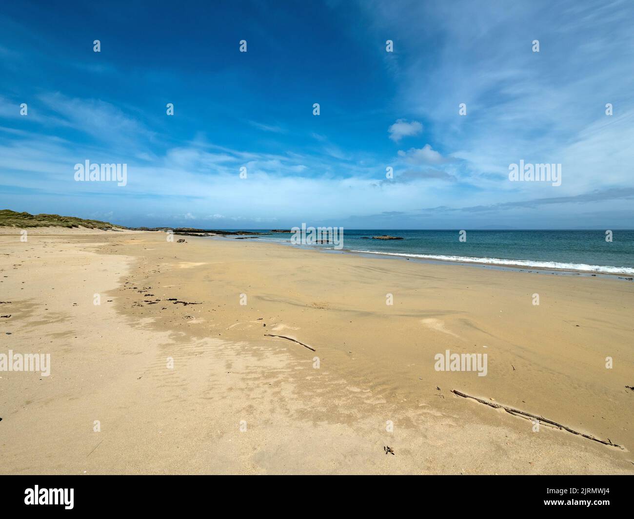 La remota e bella sabbia di Balnahard Beach sull'isola di Ebridean di Colonsay, Scozia, Regno Unito Foto Stock