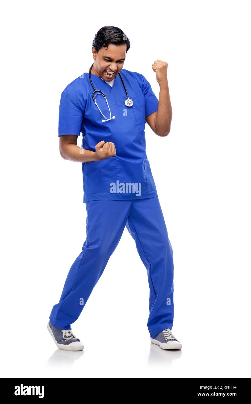 medico indiano o infermiera maschile che celebra il successo Foto Stock