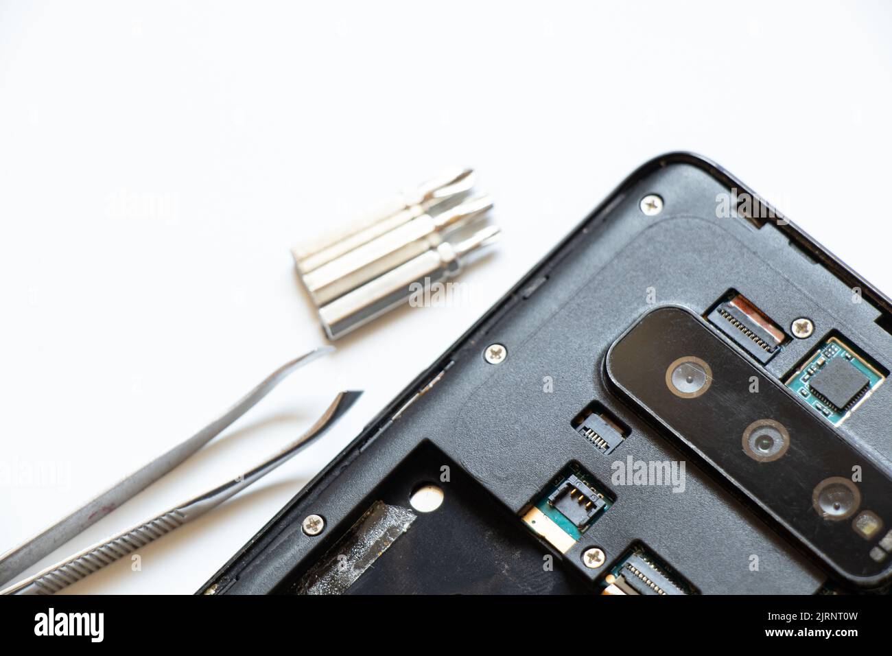 Smontaggio telefono cellulare, riparazione e manutenzione telefono, assistenza Foto Stock