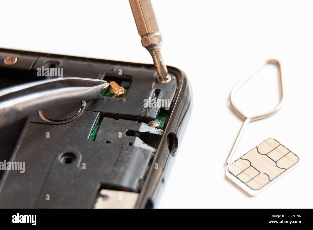 Smontaggio telefono cellulare, riparazione e manutenzione telefono, assistenza Foto Stock