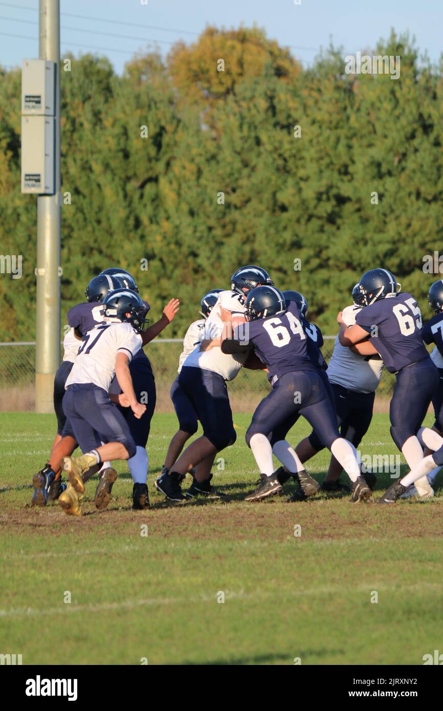 Sport autunnale, football americano giovanile Foto Stock