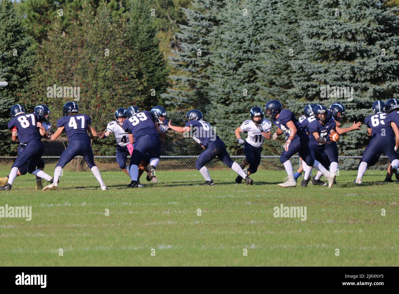 Sport autunnale, football americano giovanile Foto Stock