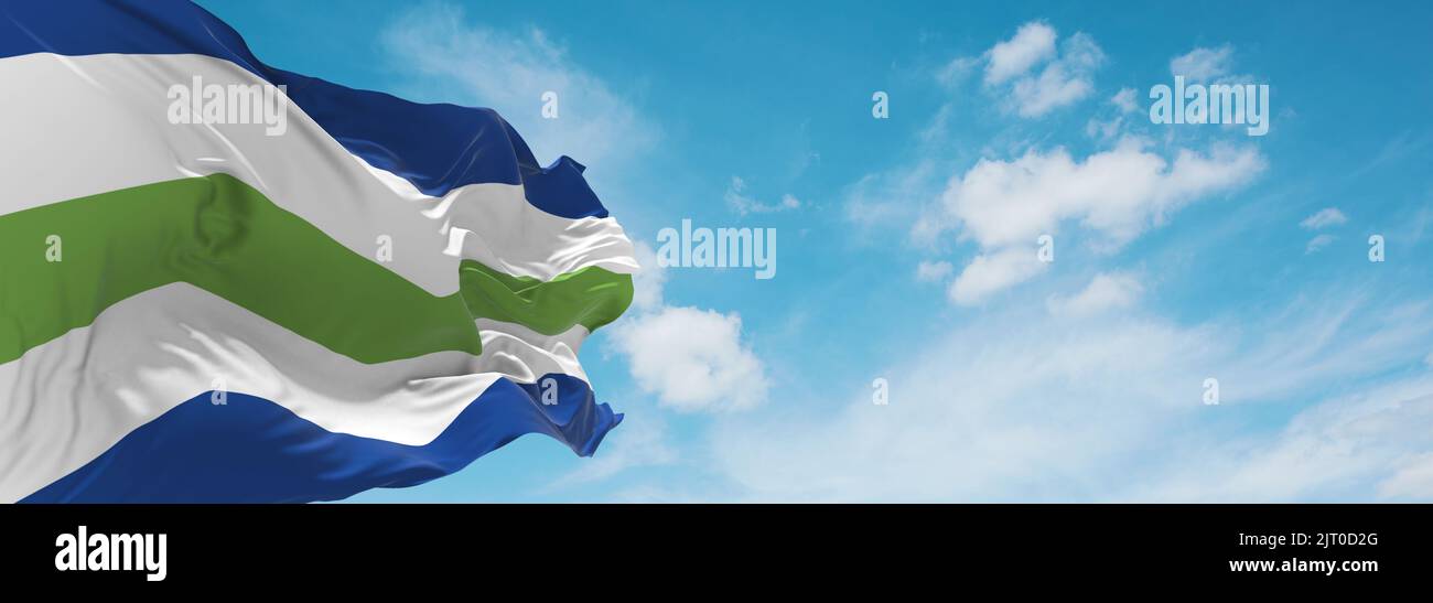 Bandiera ufficiale di Burlington, Vermont Stati Uniti d'America su sfondo cielo nuvoloso al tramonto, vista panoramica. USA Travel e patriota concetto. Copia Foto Stock